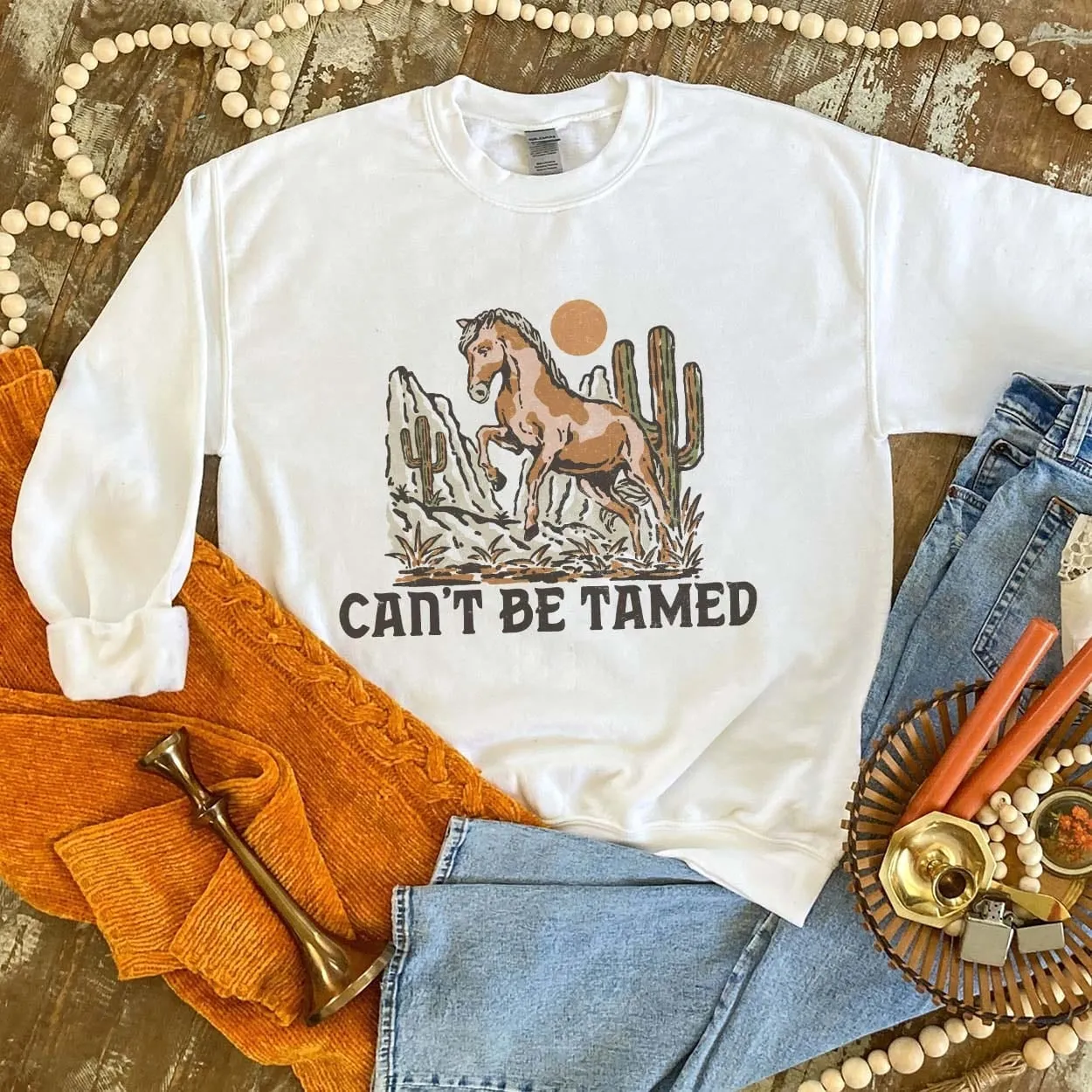 Can't Be Tamed Graphic Sweatshirt (made 2 order) LC